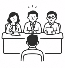 Interview panel meeting a candidate